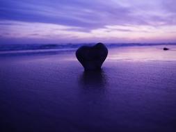 Sea Water Beach at purple sunset
