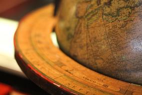 Close-up of the beautiful and colorful, shiny globe with the ring