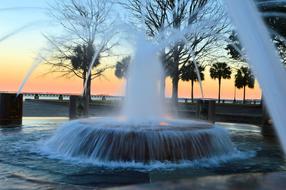 Landscape of water Fountain at Sunset