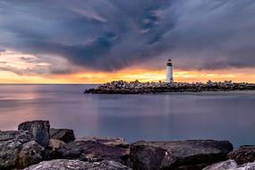 lighthouse on a rocky peninsula