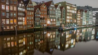 Tiny Houses Along The Water Canal