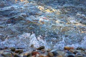 pebbles on the Mediterranean surf close-up