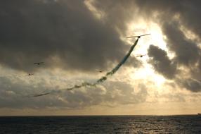 air force planes fly in the cloudy sky