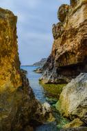 Beautiful and colorful rocky coast of Cavo Greko in Cyprus, Greece