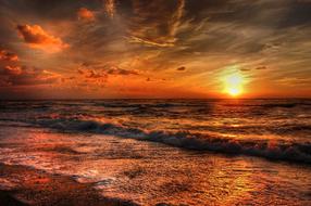 setting sun on the horizon of the sea at dusk