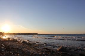 Beautiful sandy beach of the Baltic Sea, at colorful and beautiful, gradient sunset