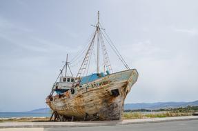 abandoned ship on the coast of greece