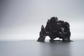 black and white, rock formation in the sea