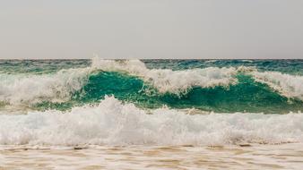 photo of Wave Smashing Sea