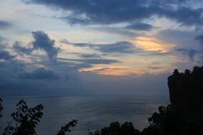 dark clouds over trees in bali