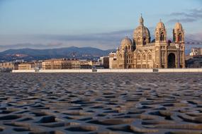 view of the historic city architecture at dusk