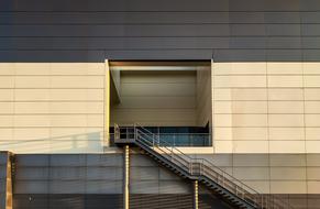 Buildings with stairs, in the sunset