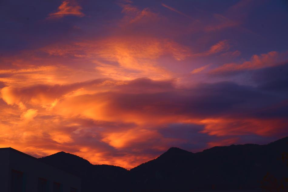 Beautiful landscape with the silhouettes of the hills, at beautiful and colorful sunset