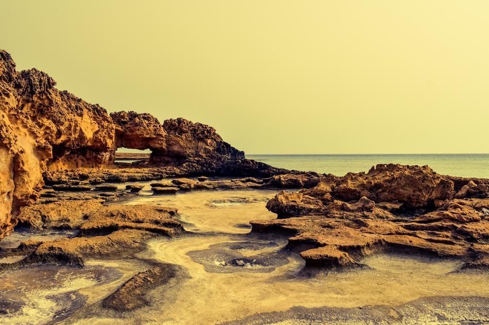 rocky coastline with erosion near the sea in cyprus