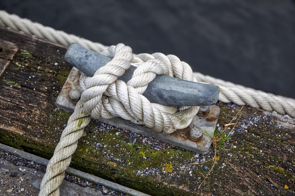 Knot on a wooden boat close up