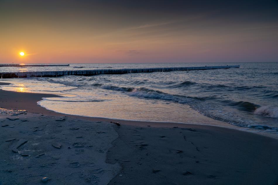 sunlight sunset over the sea surf