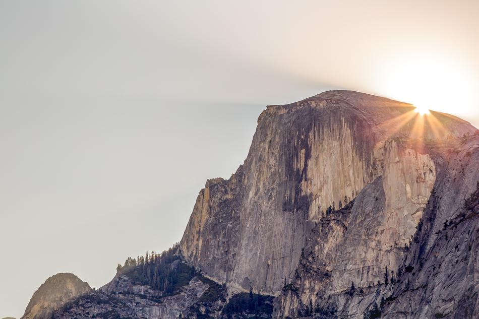 Bright sun over the rock