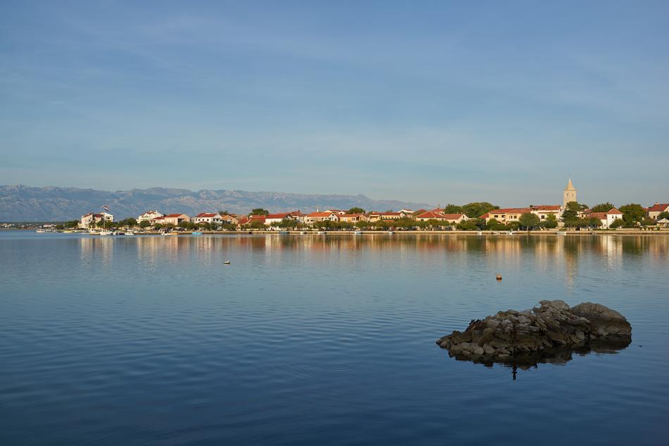 Beautiful and colorful shore of the sea with buildings, in Croatia
