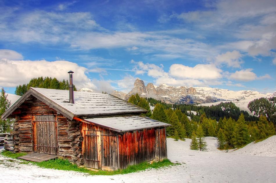 barn in the dolomites in the snow