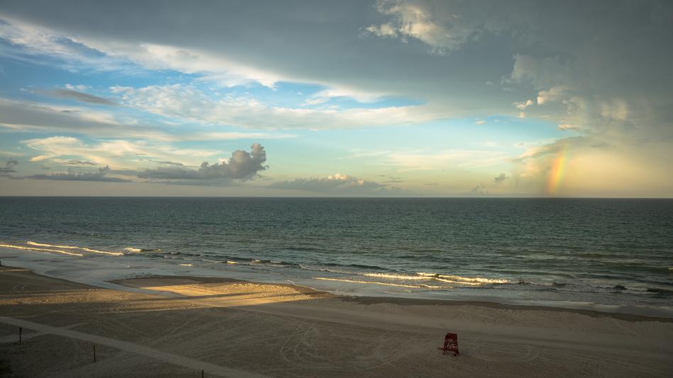 Beach and Rainbow on sky