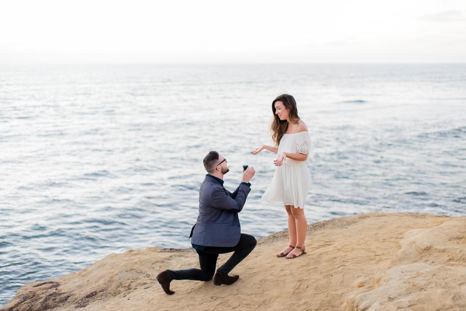 Couple wedding propose on coast