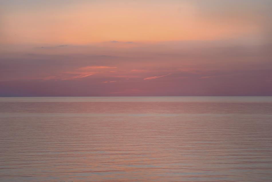 orange purple sky above water