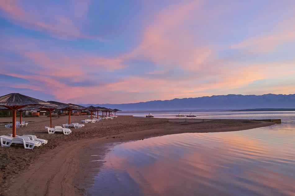 pink blue sky over a beach in croatia