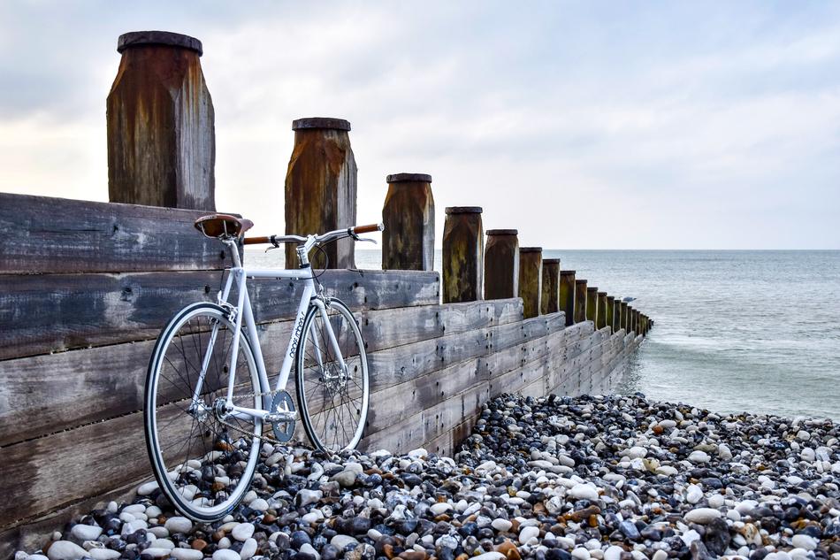bike on rocks by the breakwater