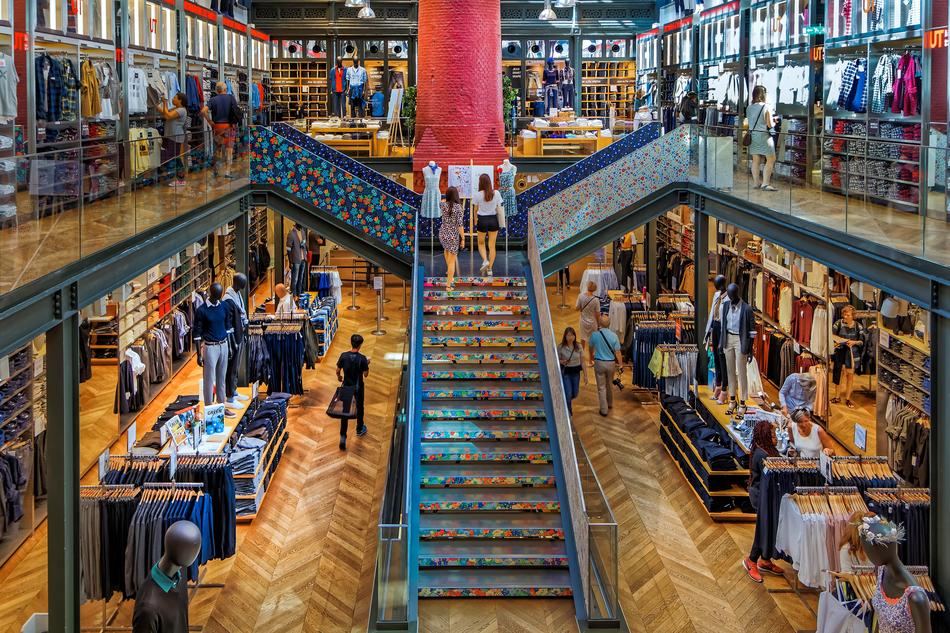 staircase in a building with shops in paris