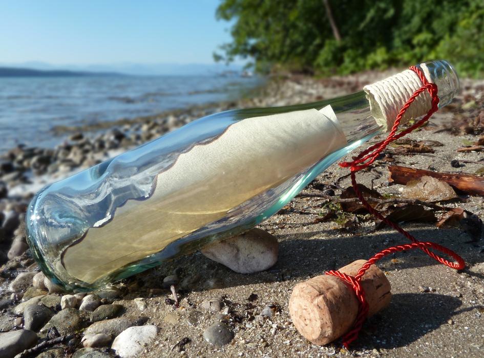 Message In A Bottle on the beach close-up