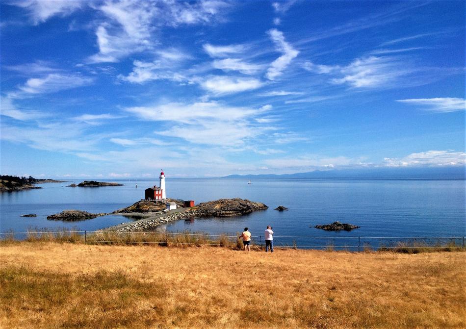 lighthouse on the background of a bright blue sky in Canada