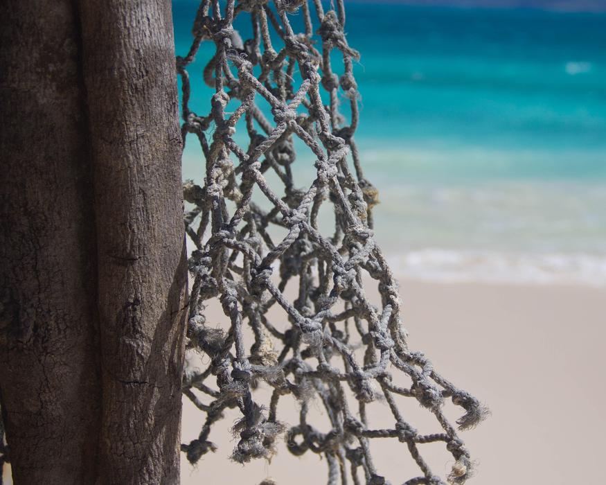 Beach Rope Net close-up on the background of water
