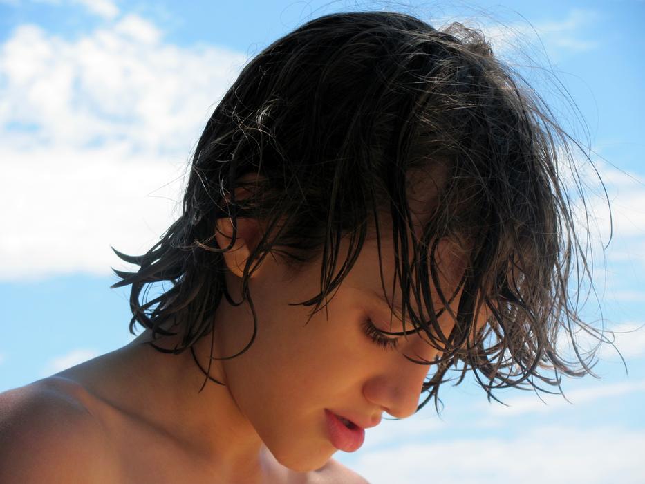handsome boy with wet hair close up