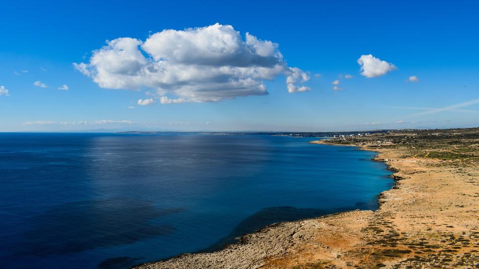 panoramic views of the endless expanses of water on cavo greko