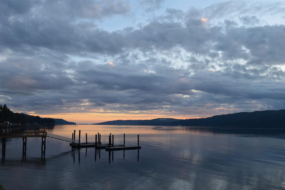 cloudy morning over wooden pier