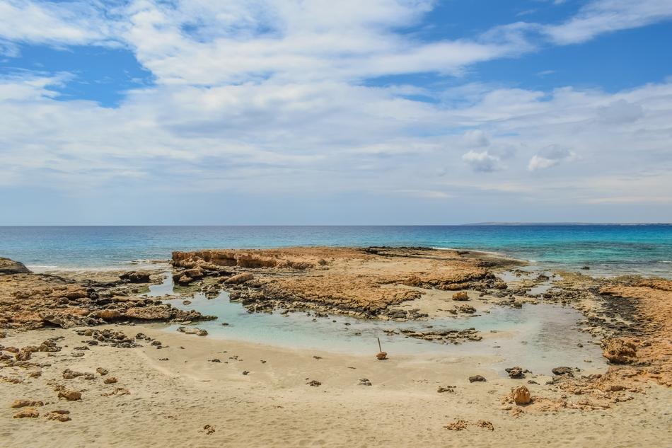golden Seashore at blue water, cyprus, ayia napa