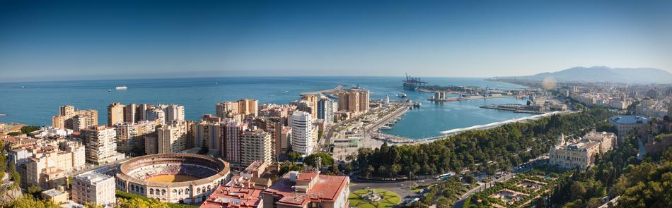 city with skyscrapers near the sea in spain