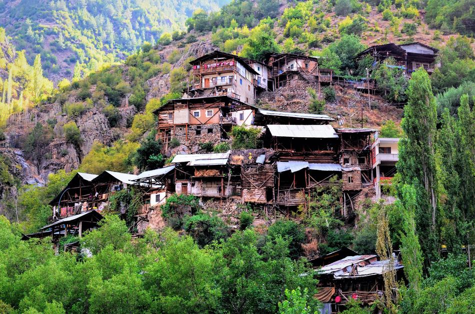 Beautiful and colorful houses on the Kaçkars in Turkey, with green plants