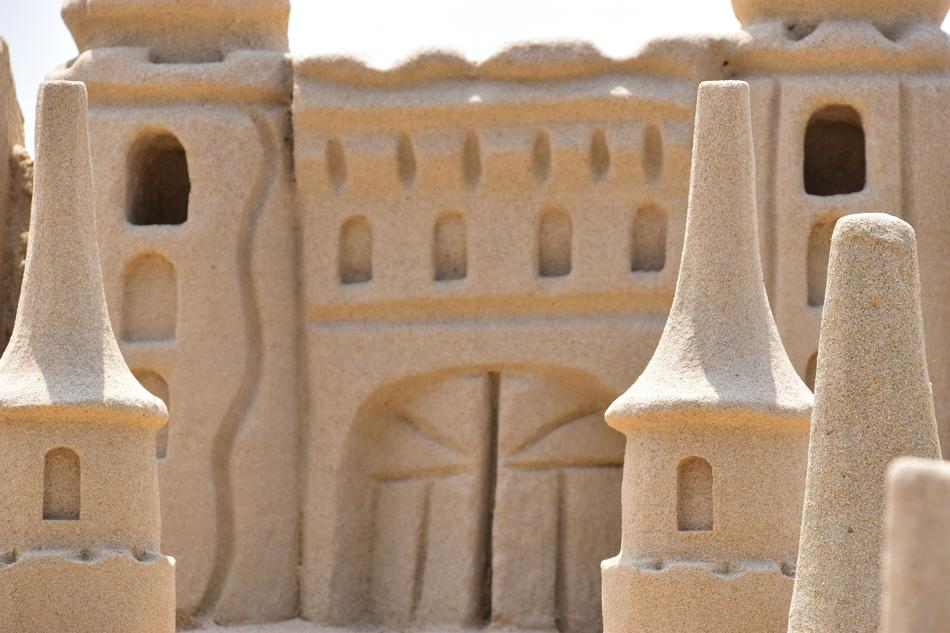 sand castle on the beach in summer close up