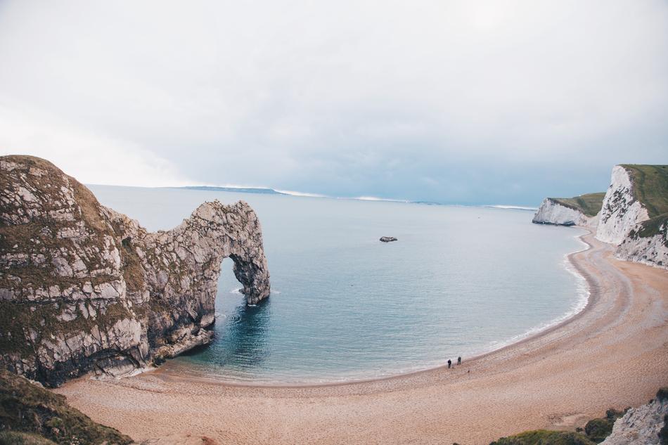 rock with an arch on the seaside