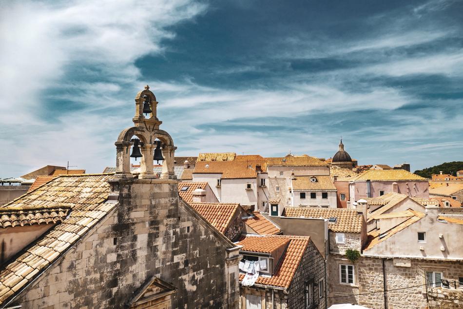 Beautiful and colorful buildings in Dubrovnik, Croatia, under the blue sky with white clouds, in 2018