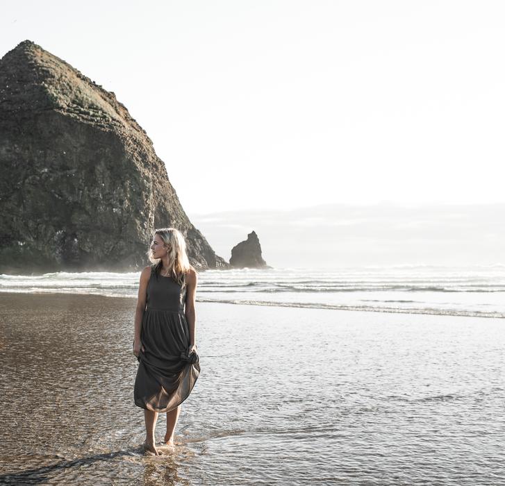 girl at beach and Mountain Hill
