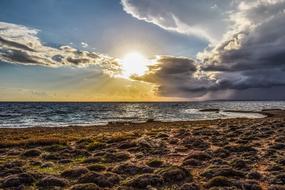 Rocky sea Coast and Sky Clouds