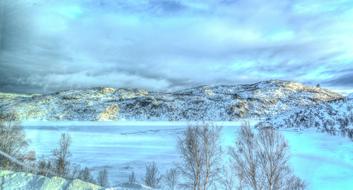 panorama of frozen lake in Kirkenes, Norway