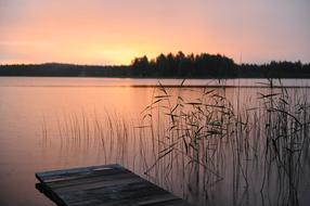pink sky above the lake during sunset