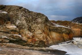 Beautiful landscape with the colorful rocks in snow