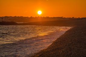 coast during sunset in england
