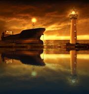 Sea Ship Lighthouse at dawn