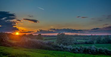 Sunset Sunrise over Field English