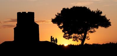 Family near tower at Sunset, Croatia